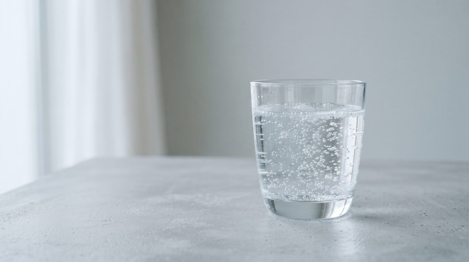 Bubbles dispersing in a glass of water